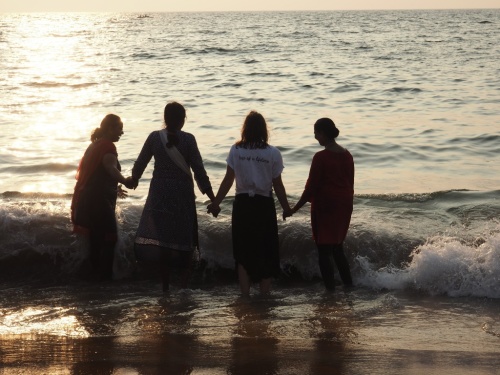 TAKING A DIP IN THE ARABIAN SEA WITH A GROUP OF WOMEN FROM KERALA WHO LET ME JOIN IN ON THEIR FUN