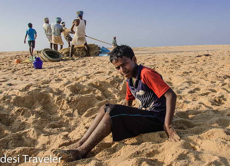 He wanted his pic to be clicked while his elders bring the net from Ocean back - See more at: http://desitraveler.com/kerala-sunrise-to-sunset/#sthash.hJpoQJoz.dpuf